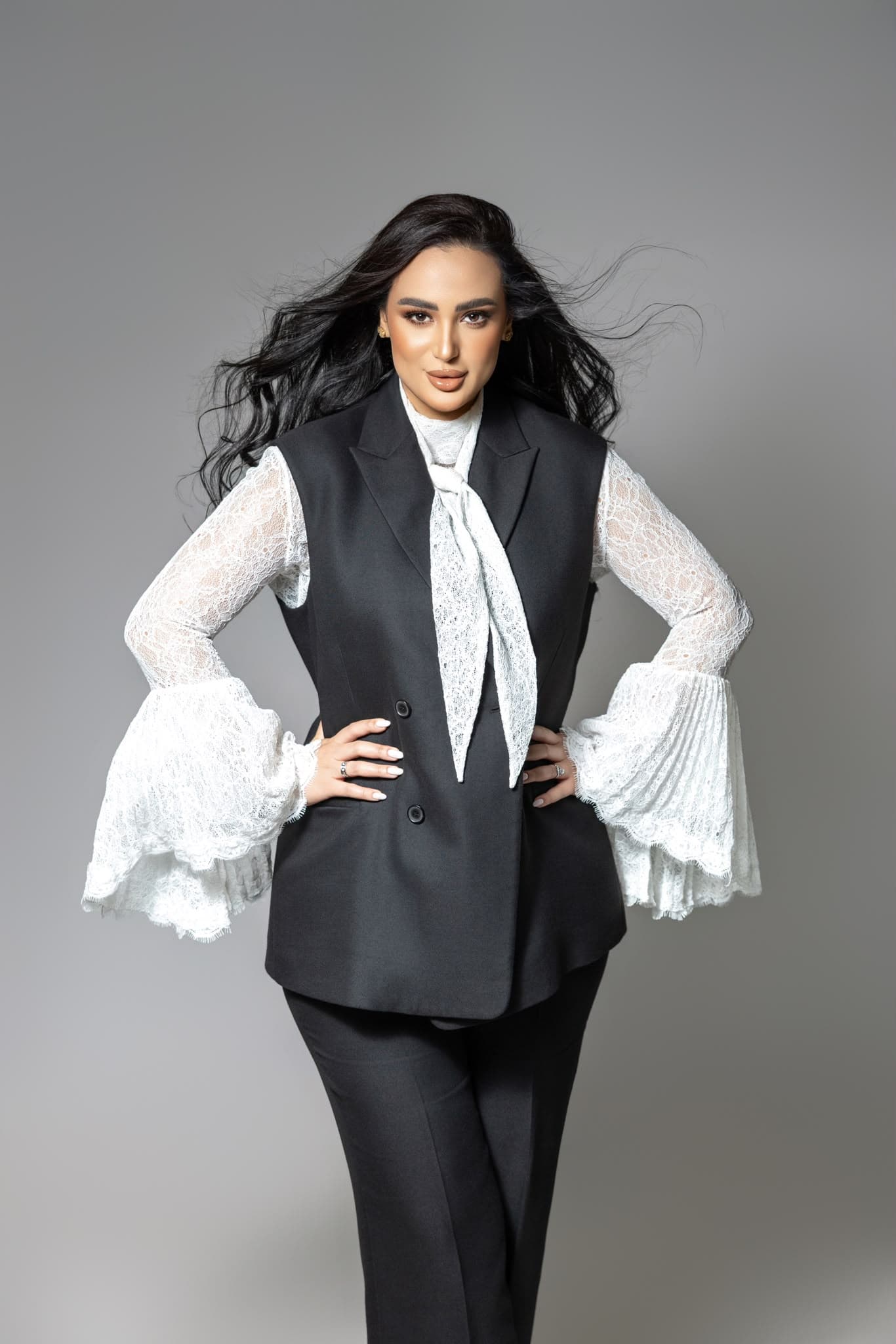 Ghada Arbi in her black suit and white lace blouse